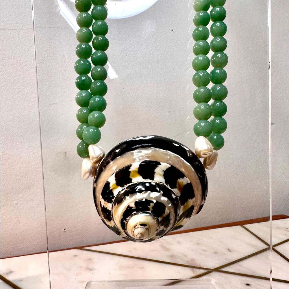 Meg Carter, classic bold statement necklace, Jade colored stones & turbo shell